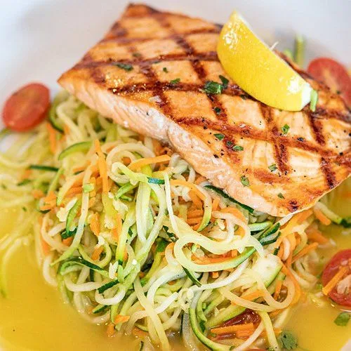Grilled salmon over zucchini noodles